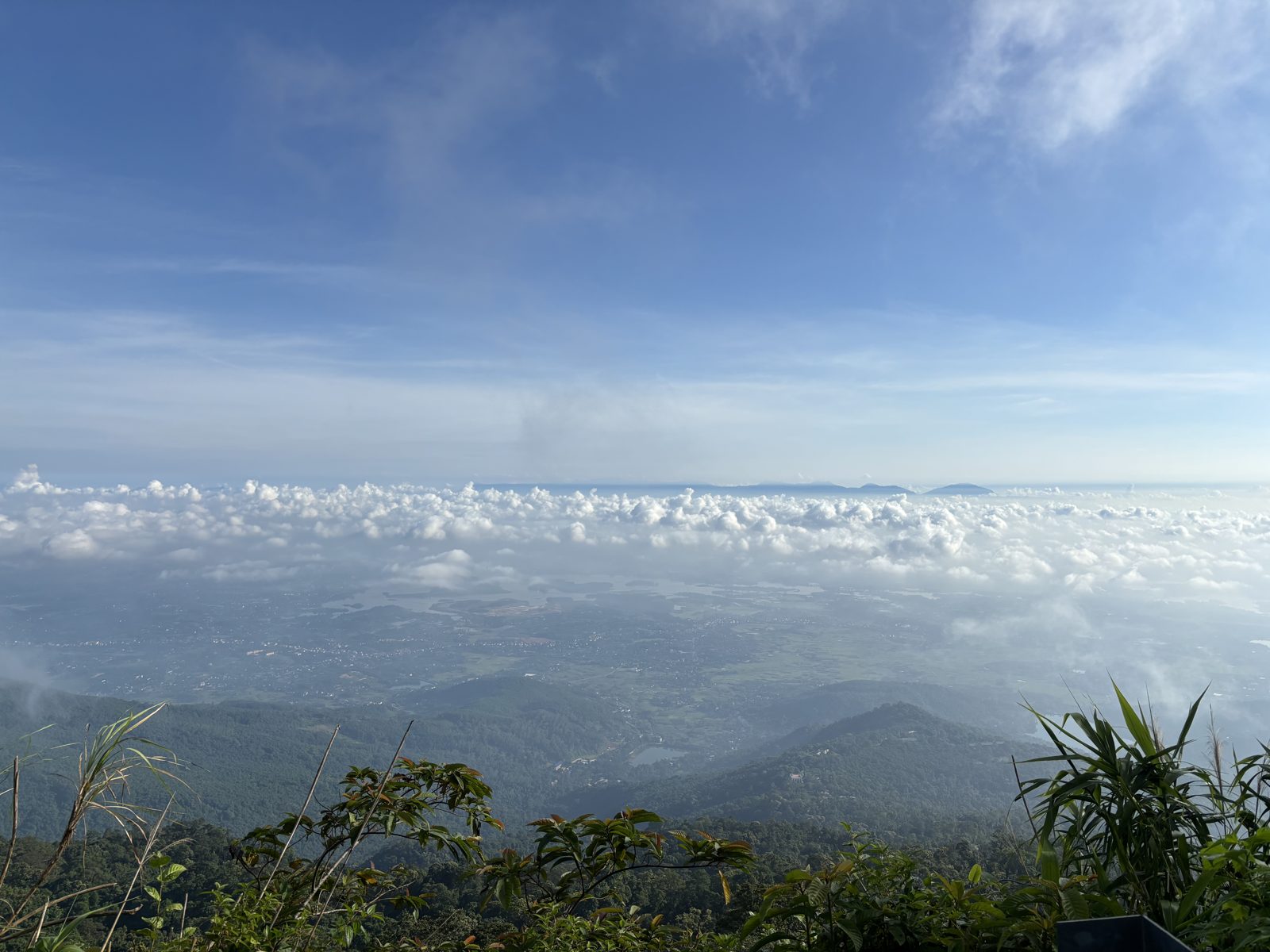 View from the summit of Ba Vì over a sea of clouds above the valley